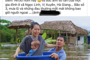 Sự thật về bức ảnh vợ chồng cùng con nhỏ khóc trong ‘biển’ nước lũ tại Hà Giang