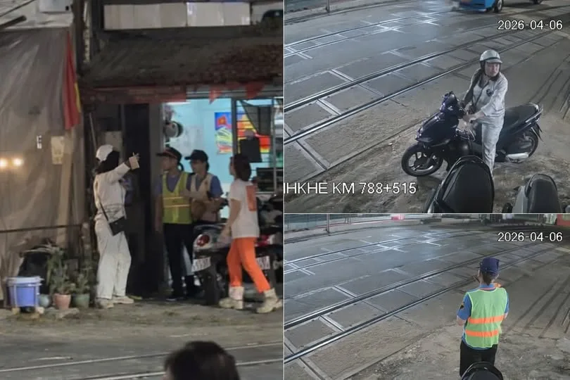 Người phụ nữ tđvl nhân viên gác chắn đang thực hiện nhiệm vụ